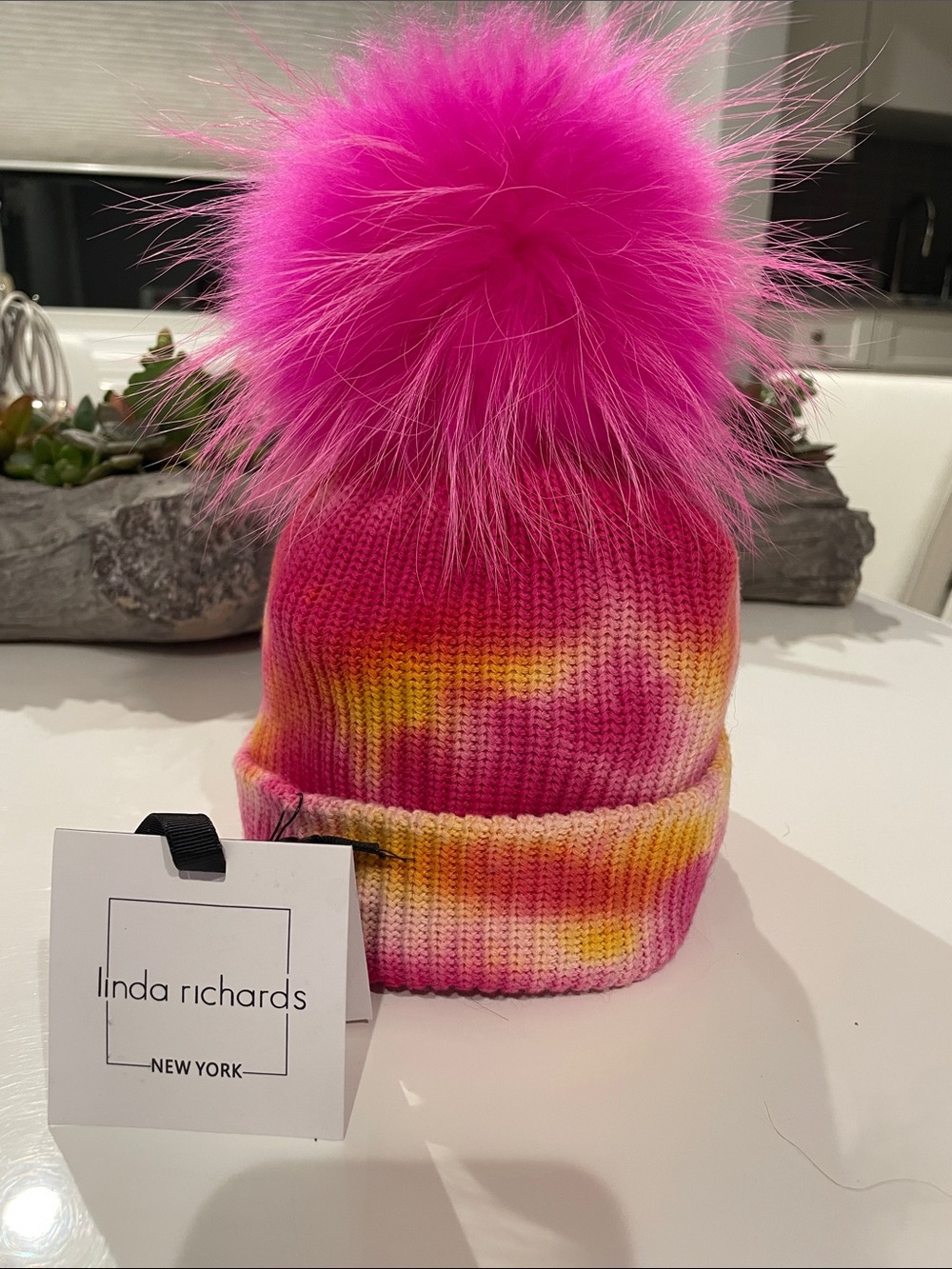Linda Richard’s Tie Dye Wool Beanie with Raccoon Pom Pom